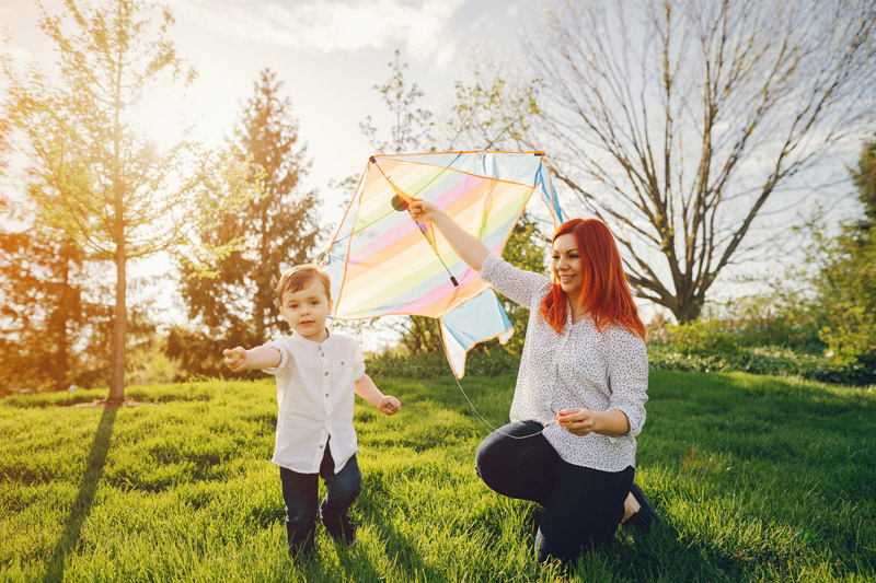 Cute Family In A Sunny Park 3v7q6xf.jpg